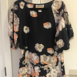 Navy dress with floral pattern. Satin fabric.